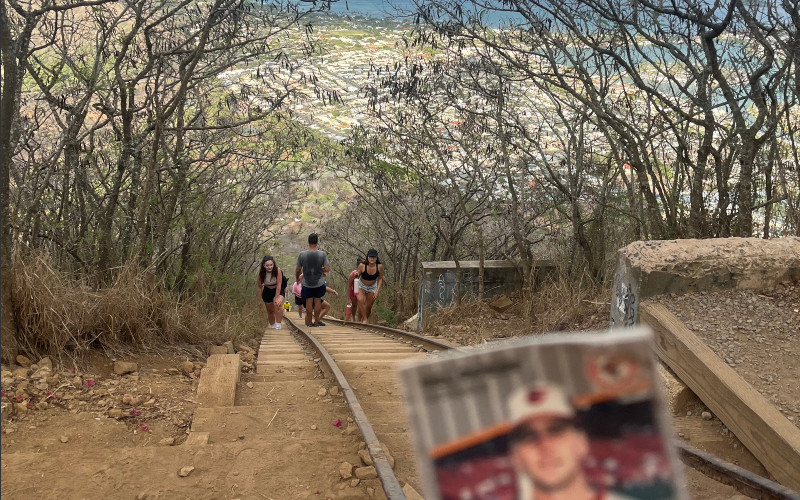 [Image: Billy Ripken card looking back at the trail from the beginning of the Koko bunker complex. A half dozen hikers are seen willing their quads to take them to the summit.]