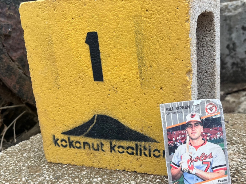 [Image: Billy Ripken card propped against the trail marker at the top of the Koko Crater Tramway.]