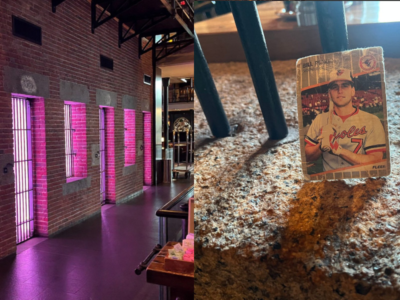 [Image: Split photograph. On the left is an interior view of the hallway approaching Clink. There is much brickwork, iron catwalks, and pink accent lighting coming through barred jail cells. On the right is a closeup of the Billy Ripken card leaning against the cell bars adjoining our table.] 